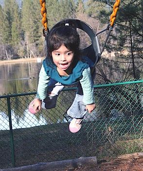 Amaryllis swinging in the park
